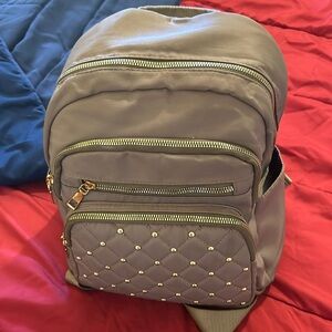 "Chic mini backpack looking for a new home! Only $10